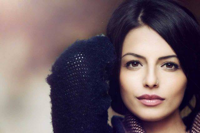 brown-eyed woman with nose ring